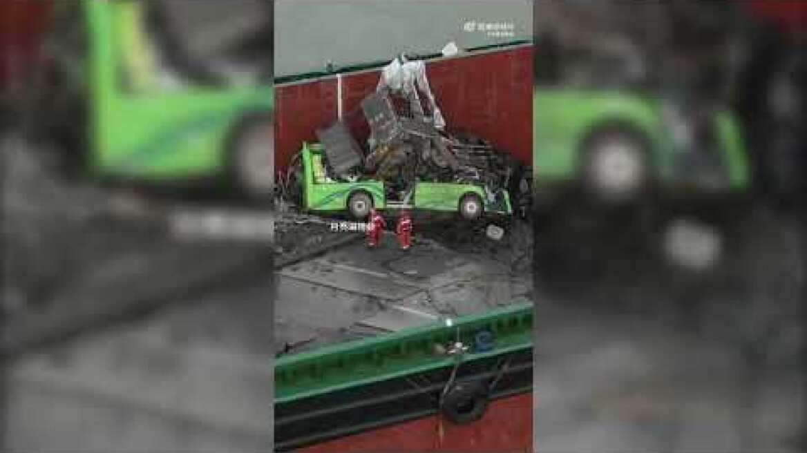 Bridge collapses in Guangzhou after cargo ship collision, sending vehicles into the water