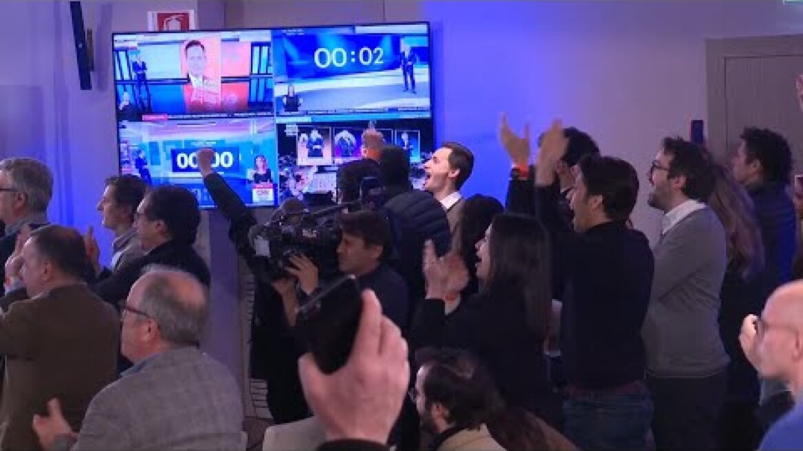 Portuguese centre right opposition party cheer exit polls predicting election win | AFP